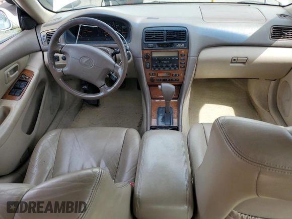 2000 Lexus ES 300 with VIN JT8BF28G6Y5099537, listed as a Copart auction lot 61873595 with 167,090 mi miles and Salvage title. Bid and sale history available at DreamBid. Image 8.