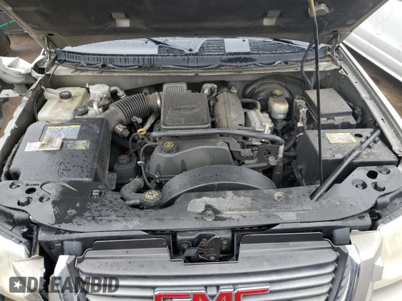 2002 GMC Envoy SLT with VIN 1GKDT13S222296226, listed as a Copart auction lot 51599295 with 148,653 mi miles and Salvage Title. Bid and sale history available at carsss.com. Image 12.