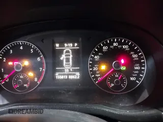 2013 Volkswagen Passat SE z VIN 1VWBH7A38DC085268, wystawiony jako IAAI lot #41811430 z przebiegiem 155 813 mil mil oraz . Historia ofert i sprzedaży dostępna na DreamBid. Obrazek 7.