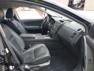 2010 Mazda CX-9 Grand Touring with VIN JM3TB2MV1A0203416, listed as a IAAI auction lot 42090500 with 131,659 mi miles and . Bid and sale history available at carsss.com. Image 5.