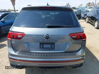 2023 Volkswagen Tiguan SE R-Line Black with VIN 3VVCB7AX8PM036684, listed as a IAAI auction lot 42169004 with 25,024 mi miles and . Bid and sale history available at DreamBid. Image 15.