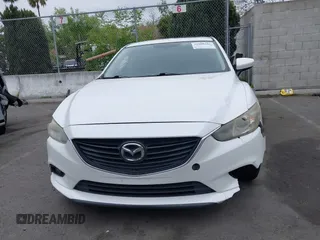 2016 Mazda Mazda6 i Touring with VIN JM1GJ1V52G1468807, listed as a IAAI auction lot 41888686 with 121,764 mi miles. Bid and sale history available at carsss.com. Image 12.