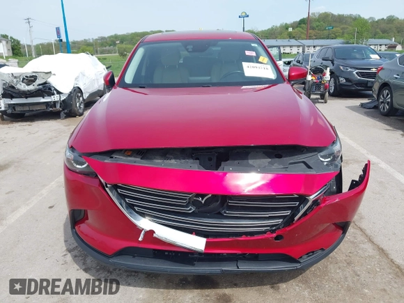 2016 Mazda CX-9 Touring with VIN JM3TCACY4G0112961, listed as a IAAI auction lot 42094718 with 114,679 mi miles and . Bid and sale history available at DreamBid. Image 12.