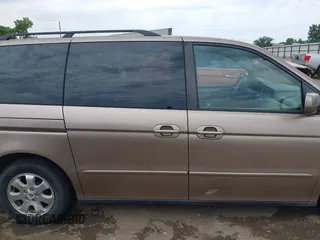 2003 Honda Odyssey EX-L z VIN 5FNRL18063B135949, wystawiony jako IAAI lot #42248105 z przebiegiem 210 567 mil mil oraz . Historia ofert i sprzedaży dostępna na DreamBid. Obrazek 13.