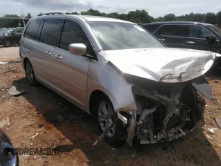 2009 Honda Odyssey Touring z VIN 5FNRL389X9B049174, wystawiony jako IAAI lot #42311648 z przebiegiem 189 999 mil mil oraz . Historia ofert i sprzedaży dostępna na DreamBid. Obrazek 1.