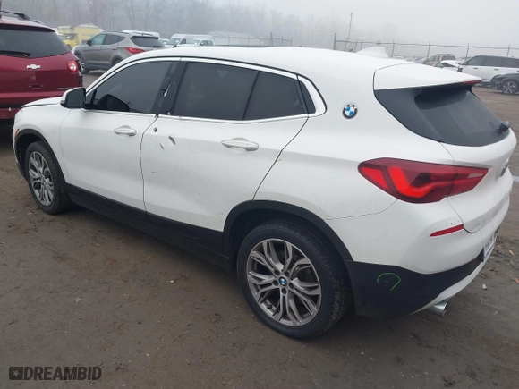 2022 BMW X2 sDrive28i with VIN WBXYH9C04N5U25732, listed as a IAAI auction lot 41015169 with 65,526 mi miles. Bid and sale history available at carsss.com. Image 3.