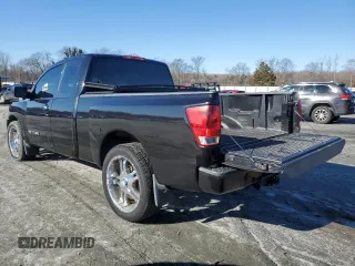 2014 Nissan Titan SE with VIN 1N6BA0CH3EN504833, listed as a Copart auction lot 87847835 with 112,217 mi miles and Salvage Title. Bid and sale history available at carsss.com. Image 2.