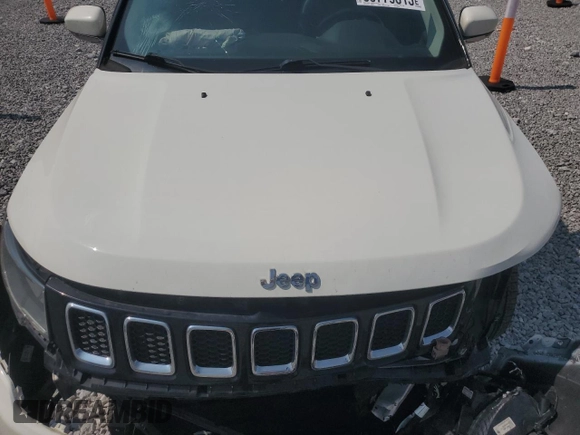 2018 Jeep Compass Limited z VIN 3C4NJDCB6JT206659, wystawiony jako Copart lot #58779315 z przebiegiem Nie podano mil oraz Szkoda całkowita • Salvage title. Historia ofert i sprzedaży dostępna na DreamBid. Obrazek 12.