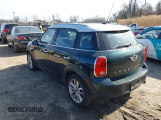 2013 MINI Countryman with VIN WMWZB3C57DWR35414, listed as a IAAI auction lot 41771890 with 141,561 mi miles and . Bid and sale history available at DreamBid. Image 3.