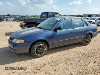 2000 Toyota Corolla VE with VIN 1NXBR12E1YZ381662, listed as a Copart auction lot 62150555 with 130,634 mi miles and Salvage title. Bid and sale history available at DreamBid. Image 1.