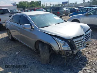 2013 Cadillac XTS Luxury z VIN 2G61R5S38D9228339, wystawiony jako IAAI lot #42664948 z przebiegiem 105 917 mil mil oraz . Historia ofert i sprzedaży dostępna na DreamBid. Obrazek 1.