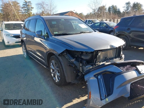 2020 Cadillac XT6 AWD Sport z VIN 1GYKPGRS8LZ150613, wystawiony jako IAAI lot #41275209 z przebiegiem 33 651 mil mil oraz . Historia ofert i sprzedaży dostępna na DreamBid. Obrazek 1.