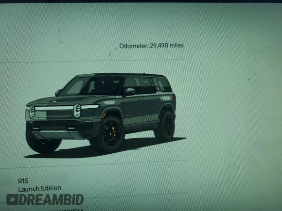 2022 Rivian R1S Launch Edition with VIN 7PDSGABL1NN000514, listed as a Copart auction lot 77444184 with 29,490 mi miles and Salvage Title. Bid and sale history available at DreamBid. Image 9.