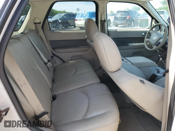 2009 Mercury Mariner Premier z VIN 4M2CU97G09KJ01723, wystawiony jako Copart lot #61134475 z przebiegiem 105 205 mil mil oraz Czysty tytuł • Clean title. Historia ofert i sprzedaży dostępna na DreamBid. Obrazek 11.