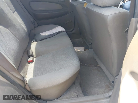 1997 Mazda Protege DX with VIN JM1BC1416V0132633, listed as a IAAI auction lot 42162630 with 234,300 mi miles and . Bid and sale history available at DreamBid. Image 8.