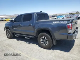 2022 Toyota Tacoma SR with VIN 3TMCZ5AN5NM482575, listed as a Copart auction lot 61498025 with 49,046 mi miles and Salvage title. Bid and sale history available at DreamBid. Image 2.