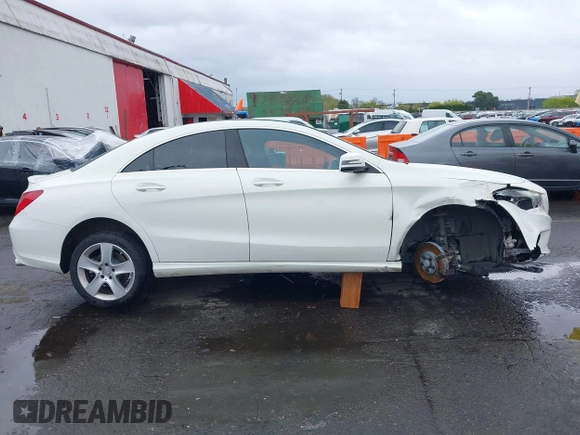 2016 Mercedes-Benz CLA 250 with VIN WDDSJ4GB1GN385737, listed as a IAAI auction lot 41970428 with 77,580 mi miles and . Bid and sale history available at DreamBid. Image 14.