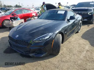 2022 BMW Z4 sDriveM40i with VIN WBAHF9C08NWX38258, listed as a IAAI auction lot 41462157 with 43,534 mi miles. Bid and sale history available at carsss.com. Image 2.