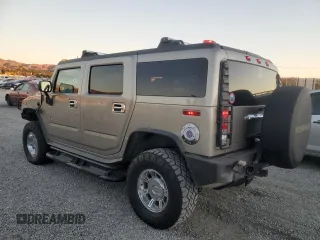2003 Hummer H2 with VIN 5GRGN23U33H124696, listed as a Copart auction lot 79452004 with 154,144 mi miles and Salvage Title. Bid and sale history available at carsss.com. Image 2.
