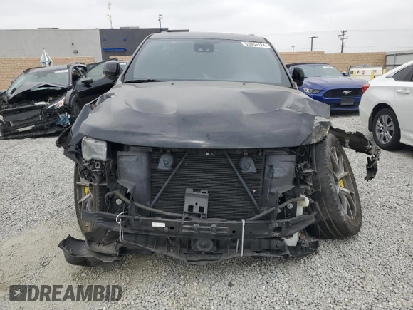 2017 Jeep Grand Cherokee SRT with VIN 1C4RJFDJ1HC904654, listed as a Copart auction lot 55954124 with 82,507 mi miles and Salvage Title. Bid and sale history available at carsss.com. Image 5.
