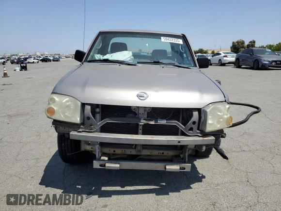 2004 Nissan Frontier XE with VIN 1N6DD26TX4C447116, listed as a Copart auction lot 59432335 with 127,001 mi miles and Salvage title. Bid and sale history available at DreamBid. Image 5.
