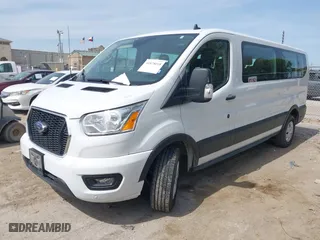 2022 Ford Transit Passenger Wagon XL with VIN 1FBAX2Y81NKA44210, listed as a IAAI auction lot 41878018 with 60,867 mi miles. Bid and sale history available at carsss.com. Image 17.