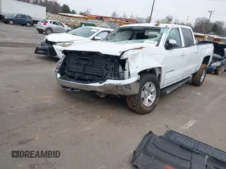 2018 Chevrolet Silverado 1500 LT with VIN 1GCUKREC0JF208509, listed as a IAAI auction lot 41794616 with 96,962 mi miles and . Bid and sale history available at DreamBid. Image 2.
