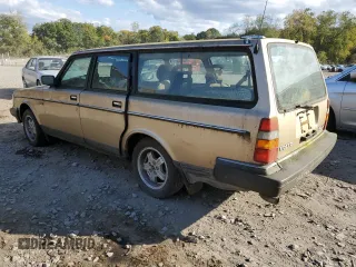 1990 Volvo 240 z VIN YV1AA8859L1850752, wystawiony jako Copart lot #75105154 z przebiegiem 200 907 mil mil oraz Tytuł czysty. Historia ofert i sprzedaży dostępna na DreamBid. Obrazek 2.