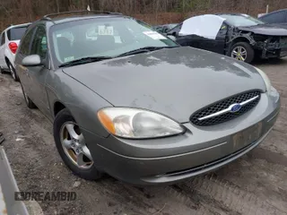2003 Ford Taurus SE Standard z VIN 1FAFP58223A170535, wystawiony jako IAAI lot #41804280 z przebiegiem 120 782 mil mil oraz . Historia ofert i sprzedaży dostępna na DreamBid. Obrazek 1.