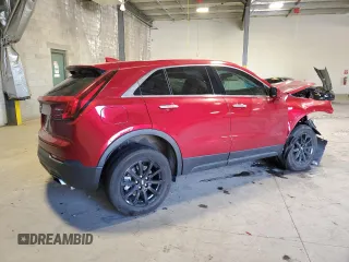 2021 Cadillac XT4 AWD Luxury with VIN 1GYFZBR44MF056778, listed as a Copart auction lot 80963854 with 32,069 mi miles and Salvage Title. Bid and sale history available at carsss.com. Image 3.