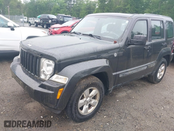 2011 Jeep Liberty Sport Jet z VIN 1J4PN2GK5BW585901, wystawiony jako IAAI lot #42459500 z przebiegiem 149 041 mil mil oraz . Historia ofert i sprzedaży dostępna na DreamBid. Obrazek 2.