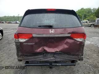 2014 Honda Odyssey LX z VIN 5FNRL5H24EB098072, wystawiony jako Copart lot #57577385 z przebiegiem 215 069 mil mil oraz Szkoda całkowita • Salvage title. Historia ofert i sprzedaży dostępna na DreamBid. Obrazek 6.