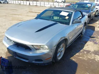 2010 Ford Mustang V6 with VIN 1ZVBP8EN9A5122431, listed as a IAAI auction lot 41802456 with 150,524 mi miles and . Bid and sale history available at carsss.com. Image 2.