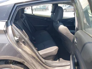 2021 Toyota Prius LE with VIN JTDKAMFPXM3170372, listed as a IAAI auction lot 42661609 with 47,977 mi miles and . Bid and sale history available at DreamBid. Image 8.