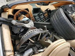 2022 Aston Martin DB11 z VIN SCFRMFCW6NGM11398, wystawiony jako Copart lot #53825715 z przebiegiem Nie podano mil oraz Szkody całkowita. Historia ofert i sprzedaży dostępna na DreamBid. Obrazek 8.