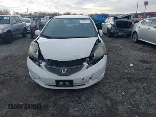 2013 Honda Fit with VIN JHMGE8H39DC005052, listed as a IAAI auction lot 41008236 with 124,874 mi miles. Bid and sale history available at carsss.com. Image 12.