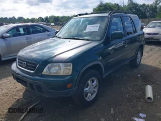 2000 Honda CR-V SE z VIN JHLRD1871YS010154, wystawiony jako IAAI lot #42541188 z przebiegiem 137 501 mil mil oraz . Historia ofert i sprzedaży dostępna na DreamBid. Obrazek 2.