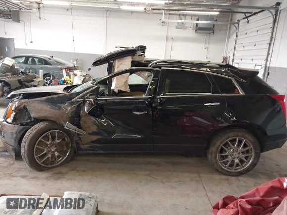2014 Cadillac SRX Premium Collection with VIN 3GYFNGE35ES636852, listed as a IAAI auction lot 42283604 with 167,983 mi miles and . Bid and sale history available at DreamBid. Image 15.