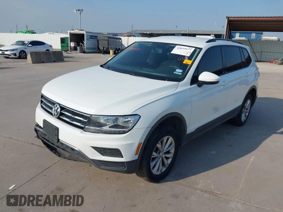 2018 Volkswagen Tiguan S with VIN 3VV1B7AX1JM119971, listed as a IAAI auction lot 42039977 with 108,932 mi miles and . Bid and sale history available at DreamBid. Image 18.