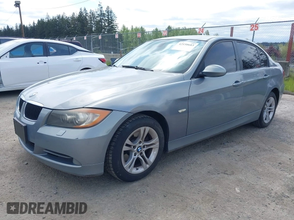 2008 BMW 3 Series 328i with VIN WBAVC53518F008938, listed as a IAAI auction lot 42150683 with 129,989 mi miles. Bid and sale history available at carsss.com. Image 2.