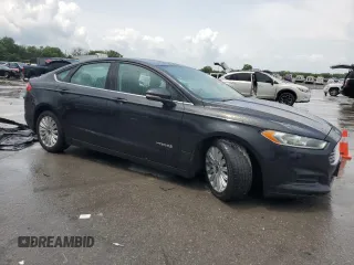 2015 Ford Fusion SE Hybrid with VIN 3FA6P0LU3FR190864, listed as a Copart auction lot 60048405 with 215,817 mi miles and Salvage title. Bid and sale history available at DreamBid. Image 4.