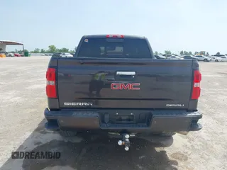 2014 GMC Sierra 1500 Denali with VIN 3GTU2WEC3EG390936, listed as a IAAI auction lot 42253577 with 196,852 mi miles and . Bid and sale history available at DreamBid. Image 16.