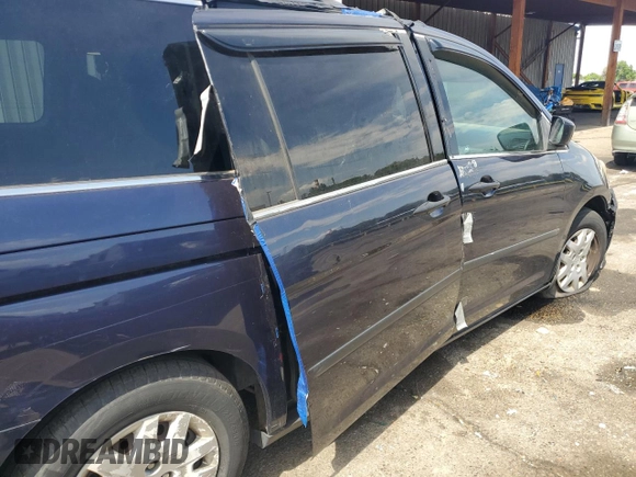 2009 Honda Odyssey LX z VIN 5FNRL38209B051664, wystawiony jako Copart lot #56710125 z przebiegiem 123 mil mil oraz Nie do naprawy • Non repairable. Historia ofert i sprzedaży dostępna na DreamBid. Obrazek 11.