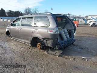 2012 Toyota Sienna SE with VIN 5TDXK3DC5CS264461, listed as a IAAI auction lot 41526874 with 1 mi miles. Bid and sale history available at carsss.com. Image 3.