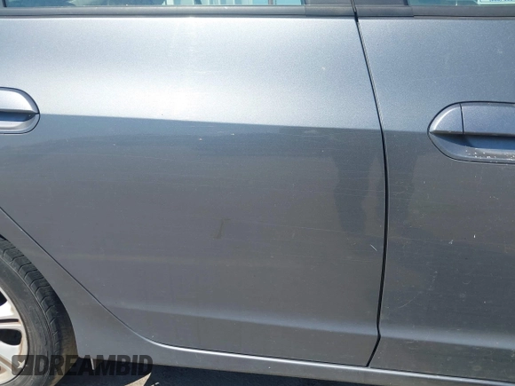 2010 Honda Insight EX with VIN JHMZE2H72AS015870, listed as a IAAI auction lot 42762384 with 58,121 mi miles and . Bid and sale history available at DreamBid. Image 12.