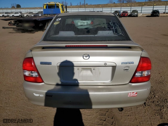 2001 Mazda Protege LX with VIN JM1BJ225410414507, listed as a Copart auction lot 83803284 with 189,914 mi miles and Salvage Title. Bid and sale history available at carsss.com. Image 6.