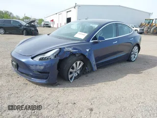 2018 Tesla Model 3 Long Range Battery z VIN 5YJ3E1EB7JF088224, wystawiony jako IAAI lot #42097665 z przebiegiem Nie podano mil oraz . Historia ofert i sprzedaży dostępna na DreamBid. Obrazek 16.