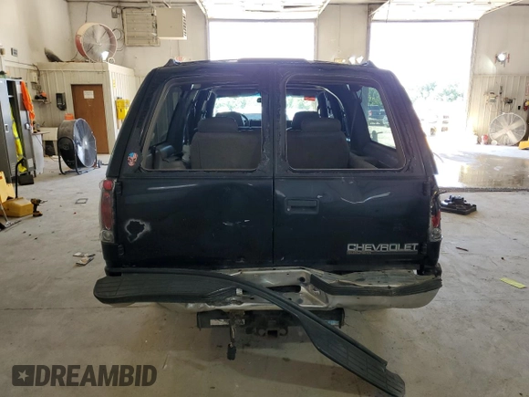 1999 Chevrolet Suburban with VIN 1GNGK26J6XJ444189, listed as a Copart auction lot 68249474 with 216,412 mi miles and Salvage Title. Bid and sale history available at carsss.com. Image 6.