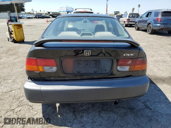 1997 Honda Civic DX with VIN 1HGEJ6128VL083271, listed as a Copart auction lot 72088024 with 329,655 mi miles and Salvage Title. Bid and sale history available at carsss.com. Image 6.