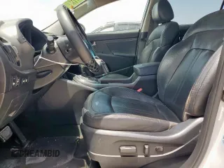 2011 Kia Sportage SX with VIN KNDPC3A69B7144103, listed as a Copart auction lot 65564145 with 94,962 mi miles and Salvage title. Bid and sale history available at DreamBid. Image 7.